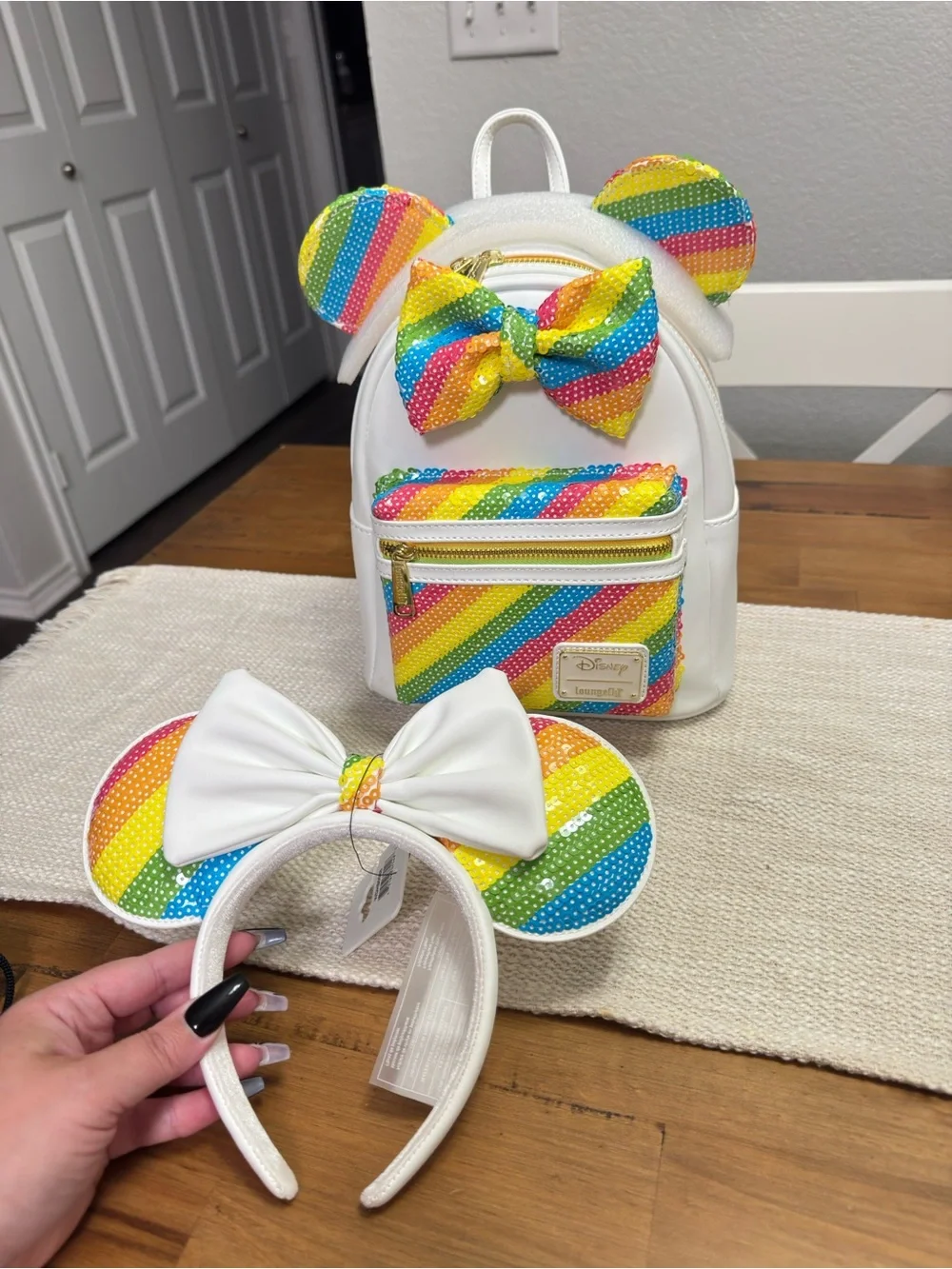 Loungefly White Mini Backpack with Rainbow Sequin Ears and Bow